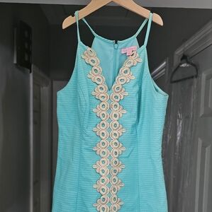 Elegant Turquoise Dress with Silver Detailing